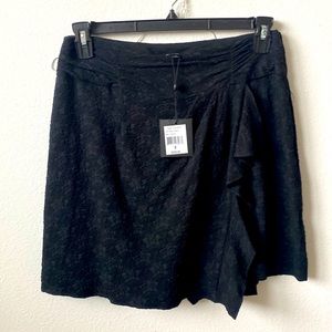 Black skirt with shorts. New with tags. Never worn.